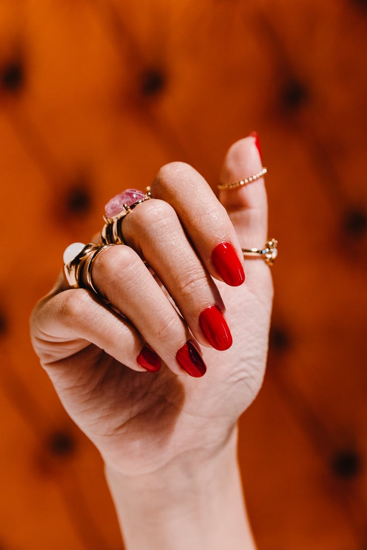 Luxe Hotel Backgrounds Manicured Hand Wearing Rings